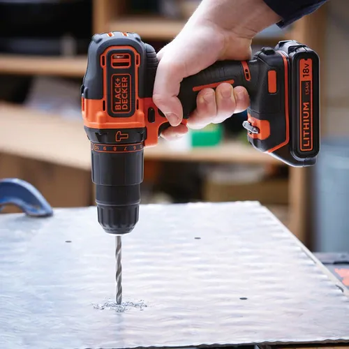 Black & Decker, 18 V Cordless with 2 Batteries in a vertical shapeon a white background colored in orange and black with Black & Decker brand logo from Saudi Supplier.