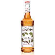MONIN Hazelnut syrup 1Ltr bottle with Light Brown color from Saudi Supplier.